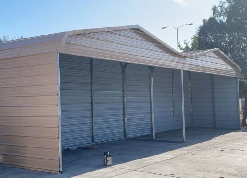 Premium extra-wide multi-vehicle beige metal carport structure with a continuous open front design and reinforced steel frame.